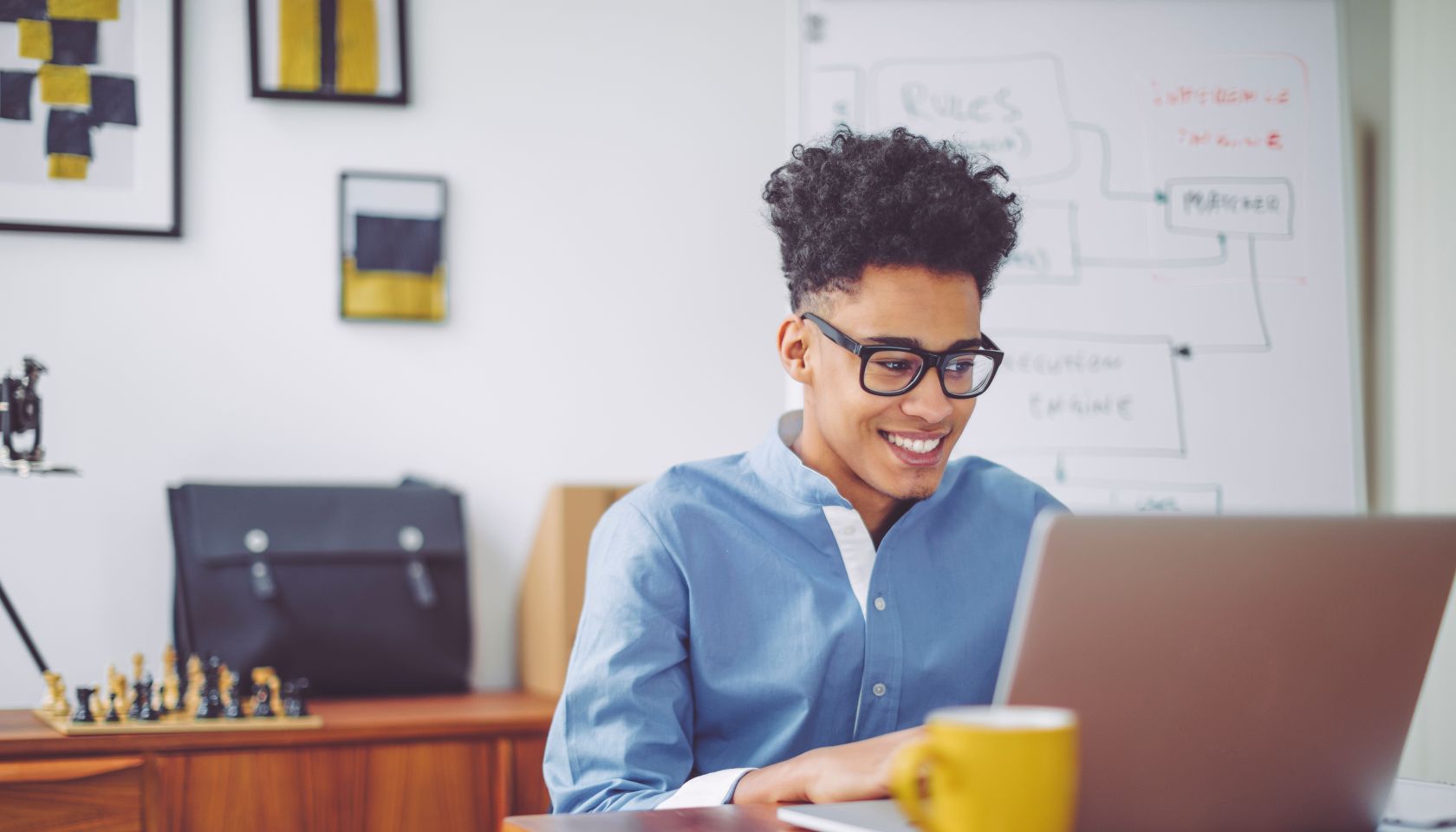 Young man working at home office