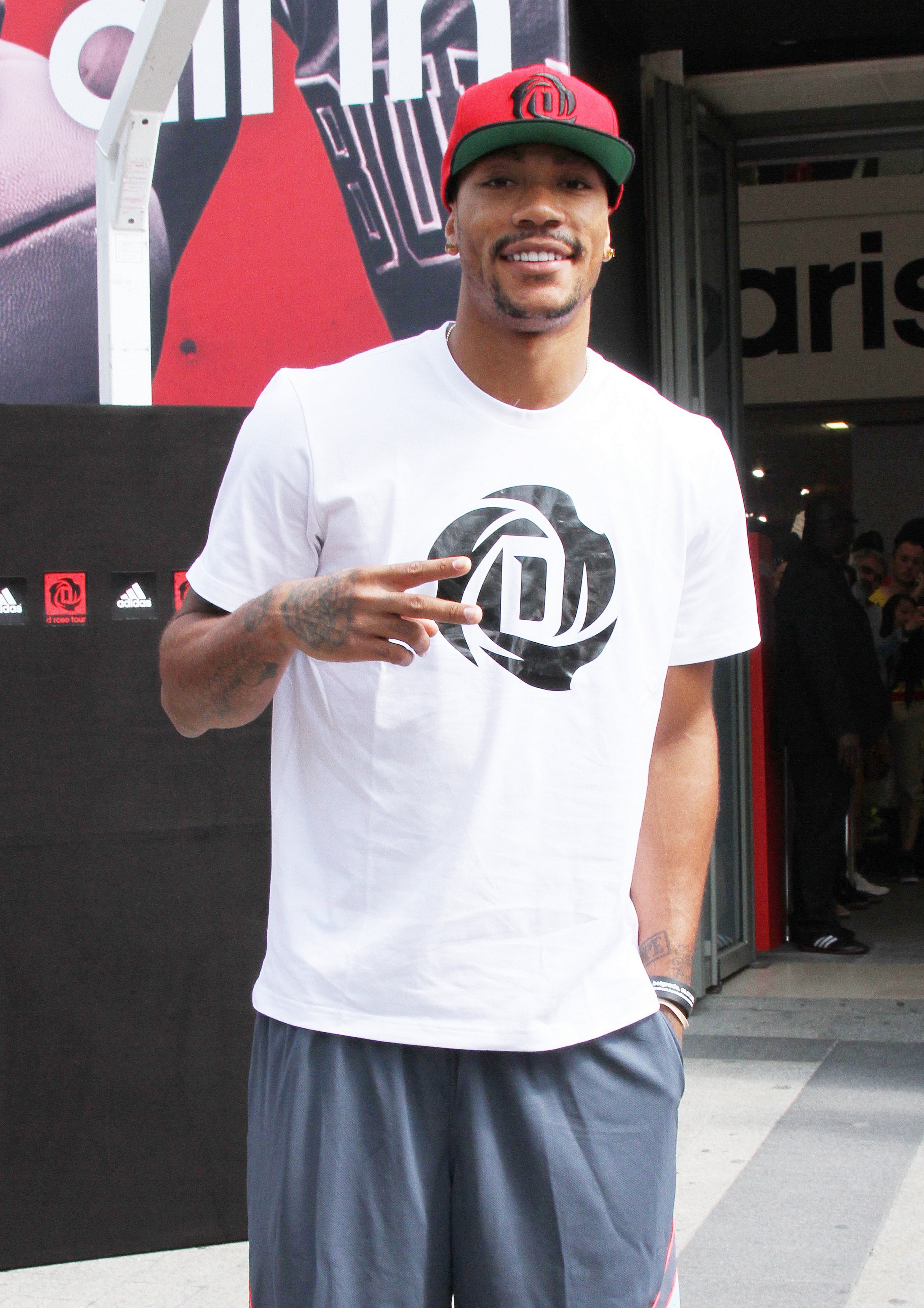 Chicago Bulls player Derrick Rose attends an in-store Adidas promotional event near Champs Elysees