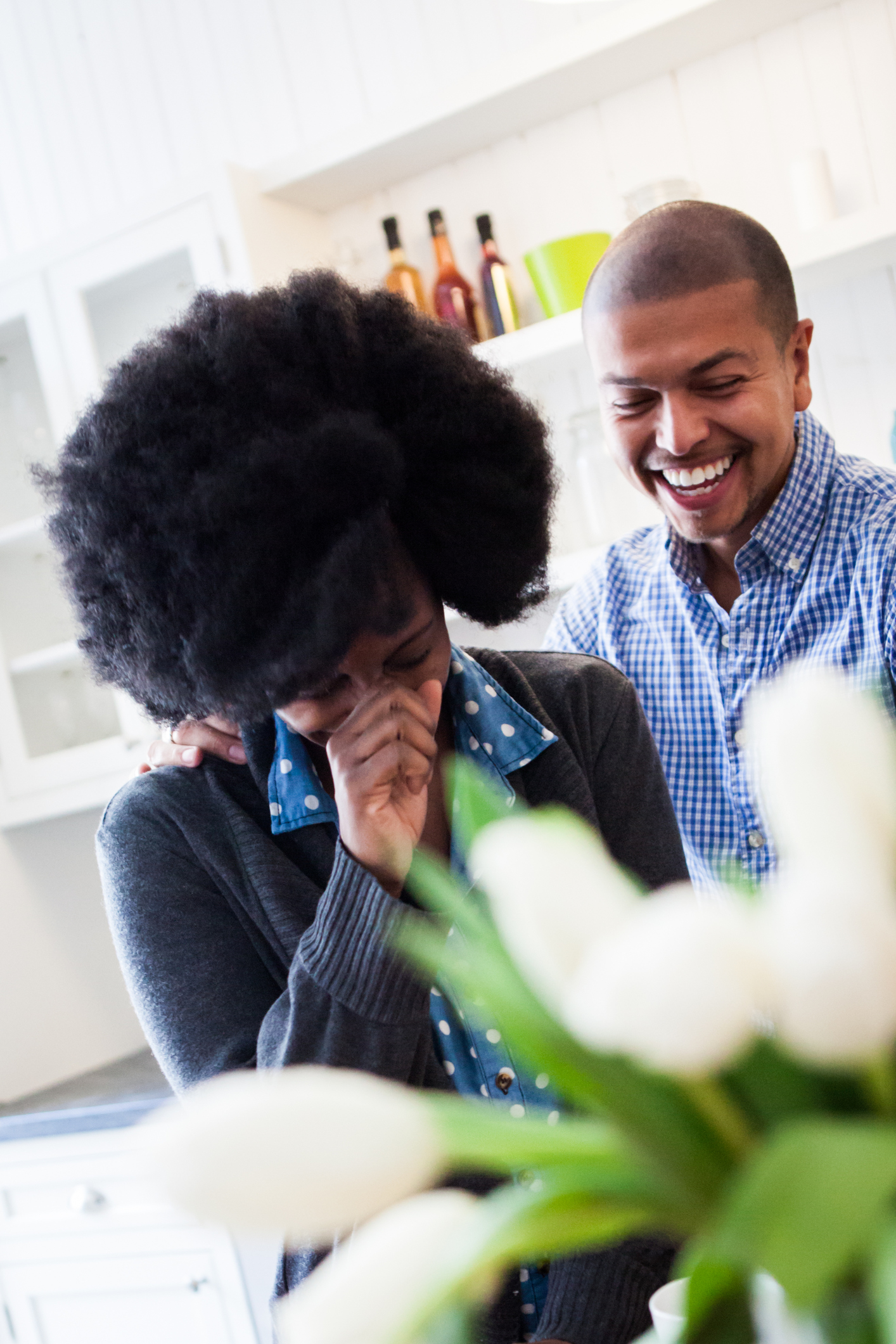North american mixed-race couple in the kitchen