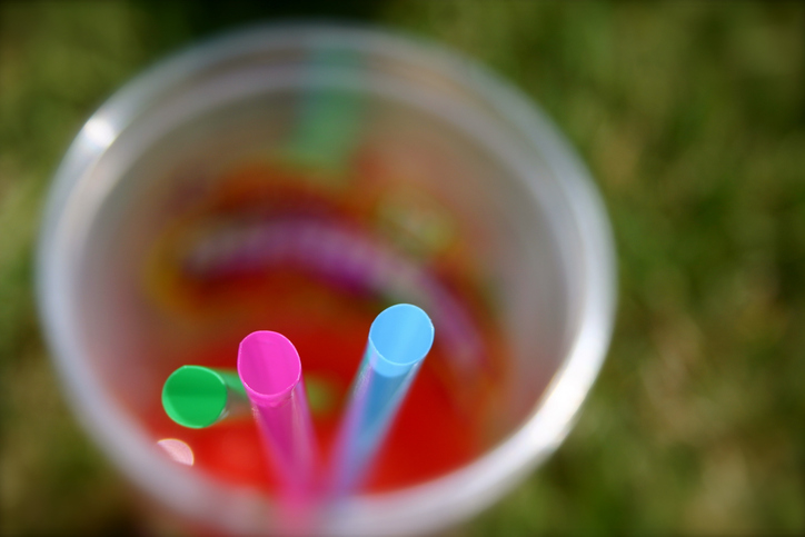 Slurpee (Frozen Drink) Straws in Grass